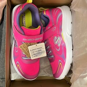 Skechers size 5 youth.  Brand new in box.